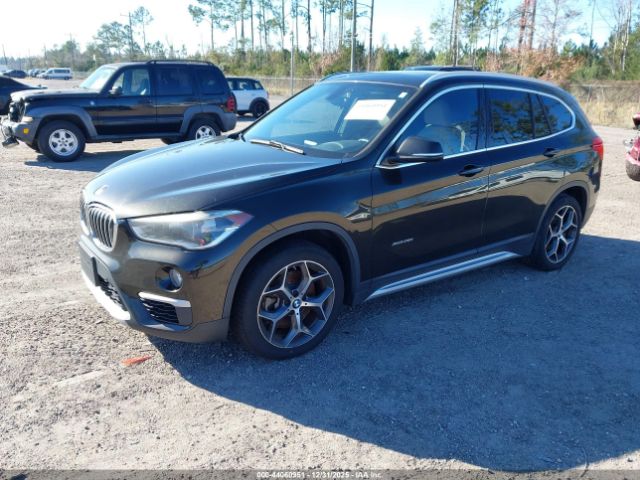 2016 BMW X1 WBXHT3C32GP887249 Photo 1