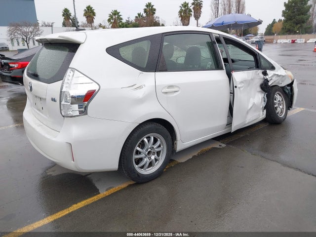 JTDZN3EU3E3310557 Toyota Prius V Three