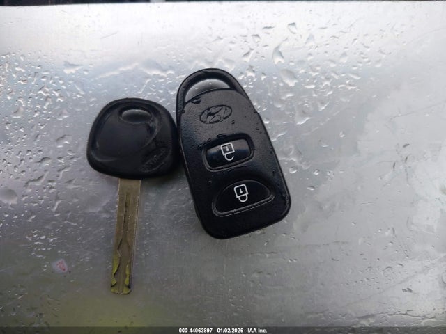 KM8JUCAG1EU877839 Hyundai TUCSON SE