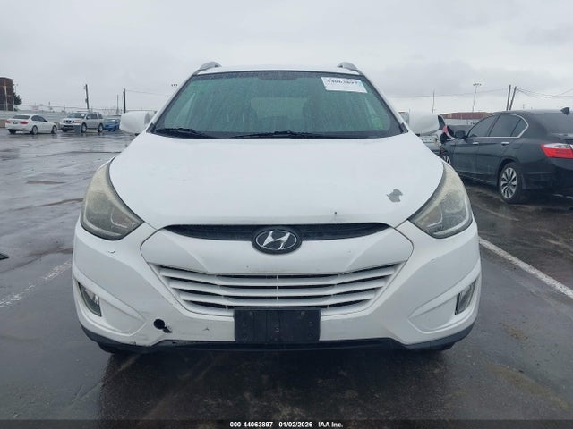 KM8JUCAG1EU877839 Hyundai TUCSON SE