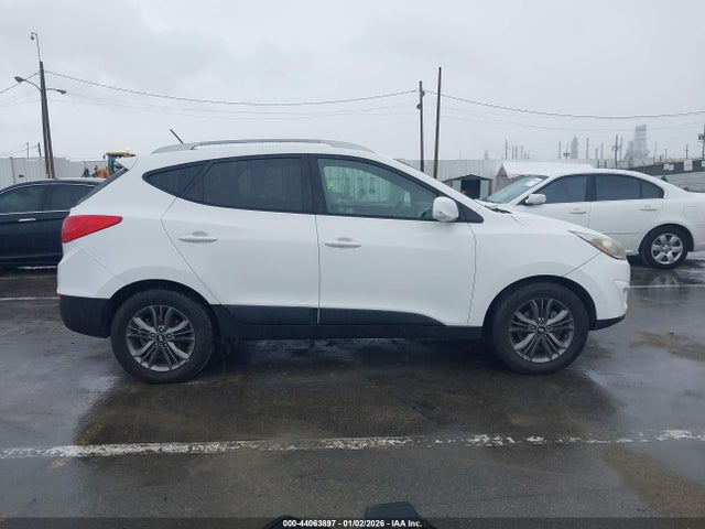 KM8JUCAG1EU877839 Hyundai TUCSON SE