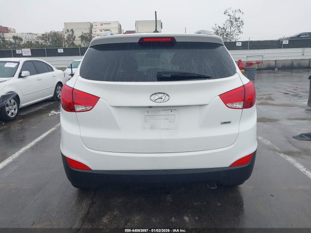 KM8JUCAG1EU877839 Hyundai TUCSON SE