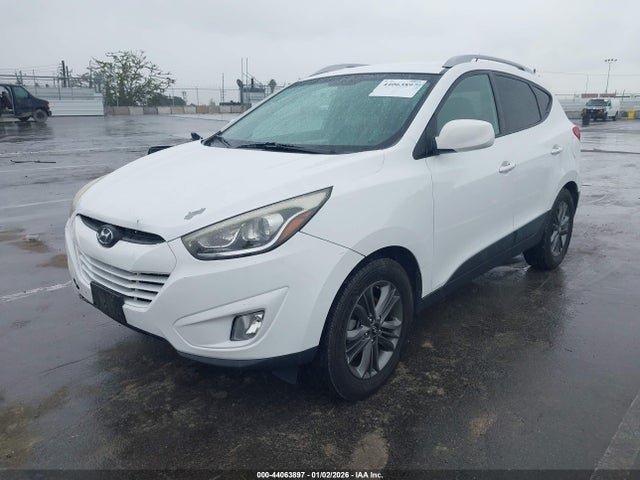 KM8JUCAG1EU877839 Hyundai TUCSON SE