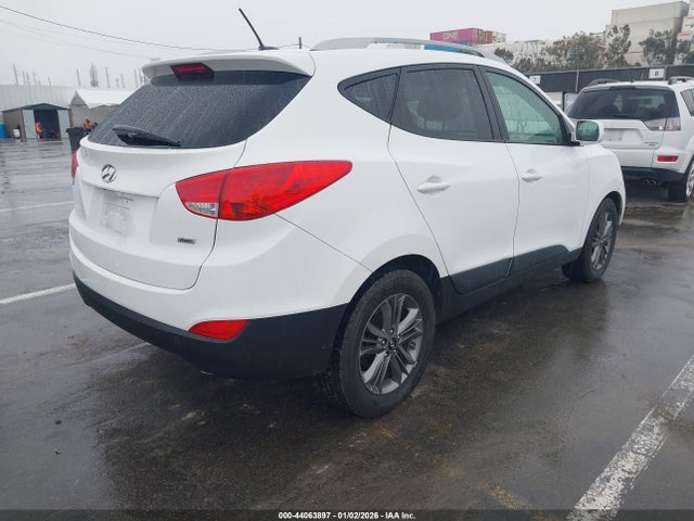 KM8JUCAG1EU877839 Hyundai TUCSON SE