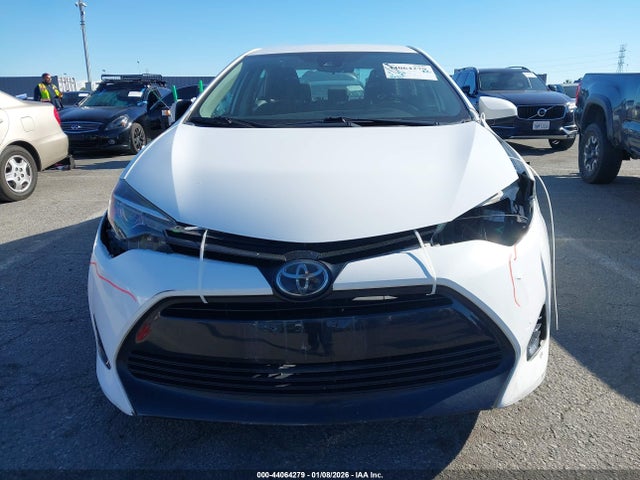 2T1BURHE6KC140029 Toyota COROLLA LE