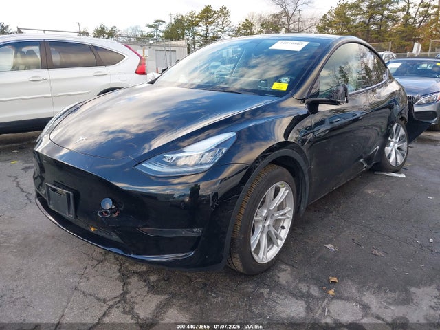 2023 TESLA MODEL Y 7SAYGDEE0PA044022 Photo 1
