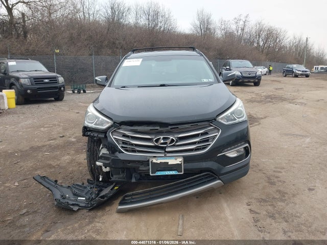 5NMZU3LBXHH011660 Hyundai Santa Fe Sport 2.4l
