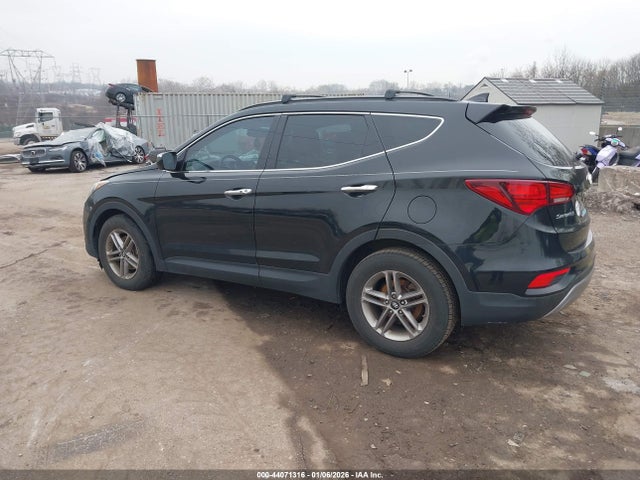 5NMZU3LBXHH011660 Hyundai Santa Fe Sport 2.4l