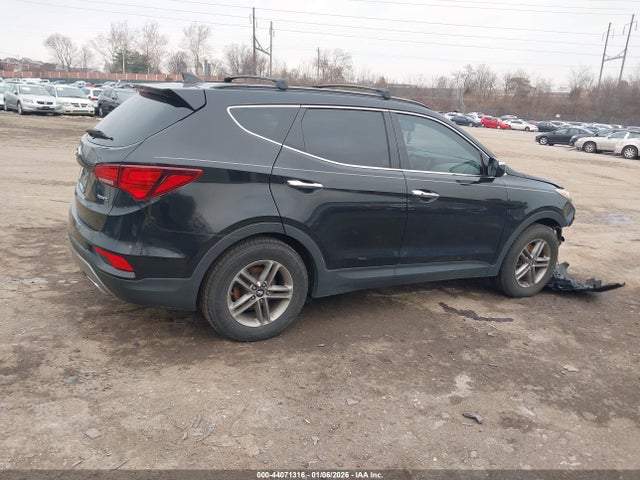 5NMZU3LBXHH011660 Hyundai Santa Fe Sport 2.4l