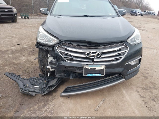 5NMZU3LBXHH011660 Hyundai Santa Fe Sport 2.4l