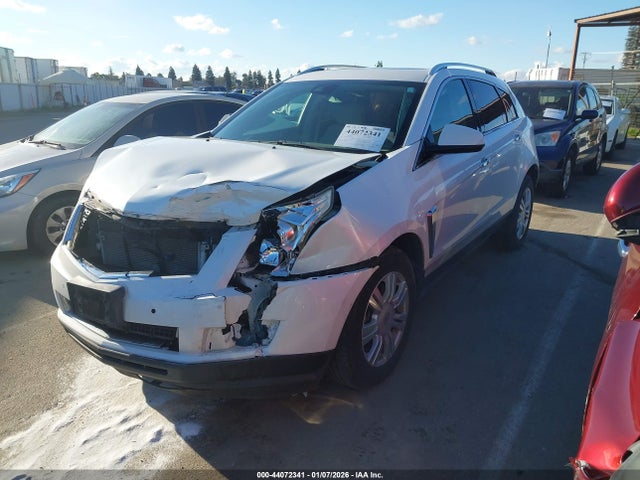 2014 CADILLAC SRX 3GYFNBE35ES658045 Photo 1