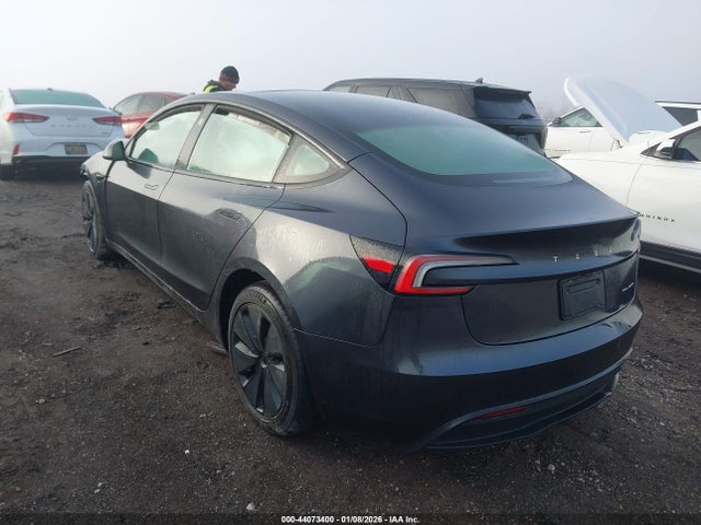 2025 TESLA MODEL 3 5YJ3E1EBXSF928529 Photo 2