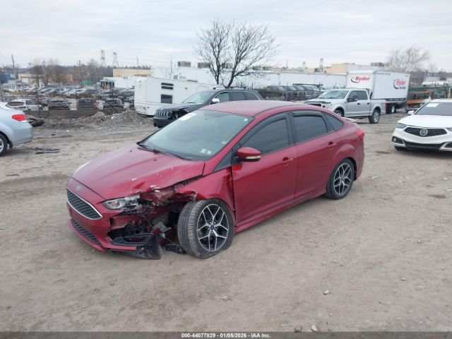 2015 FORD FOCUS 1FADP3F2XFL381389 Photo 1