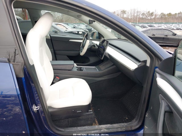 2023 TESLA MODEL Y 7SAYGDEF6PF714765 Photo 4