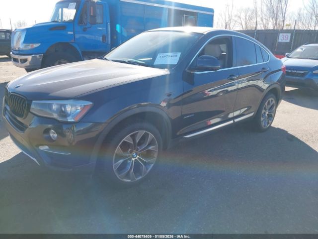 2015 BMW X4 5UXXW3C51F0M88002 Photo 1