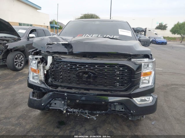 Ford tivct 2021 1FTMF1CBXMKF09011 Image 13