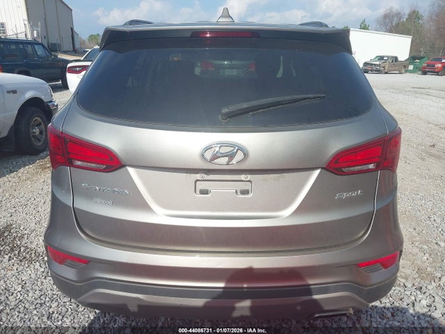 5NMZU3LB9JH052609 Hyundai Santa Fe Sport 2.4l