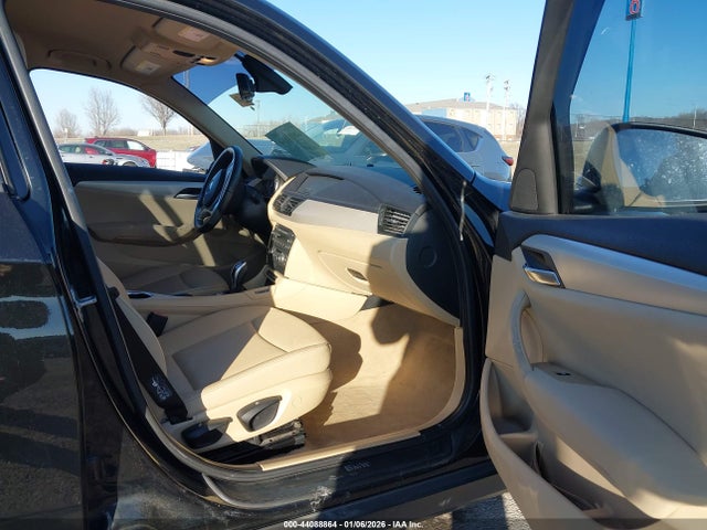 2013 BMW X1 WBAVM1C52DVW44273 Photo 4