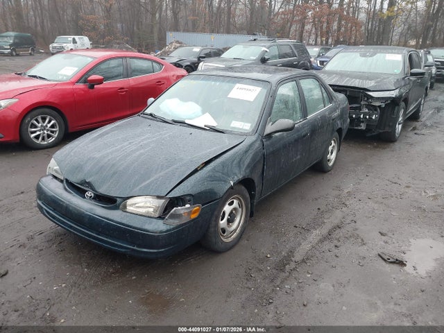 1999 TOYOTA COROLLA 2T1BR12E3XC128052 Photo 1