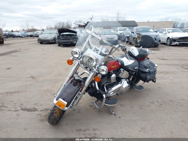 2010 HARLEY-DAVIDSON FLSTC 1HD1BW517AB032824 Photo 1