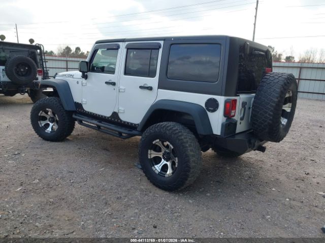 2011 JEEP WRANGLER UNLIMITED 1J4BA6H10BL536027 Photo 2