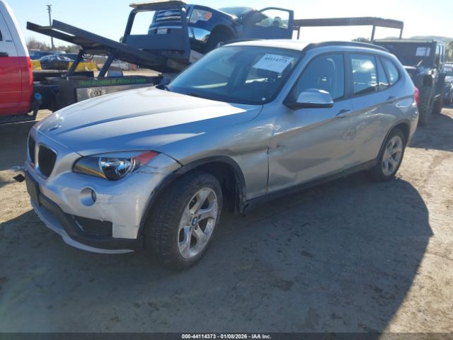 2015 BMW X1 WBAVM1C54FV318624 Photo 1