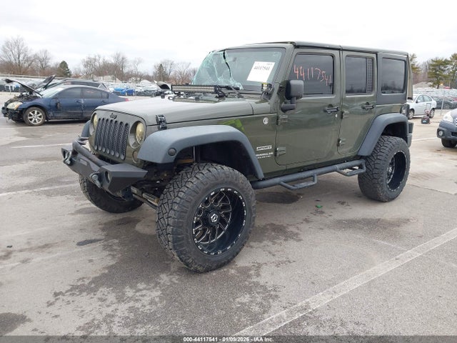 1C4HJWDG5FL761530 Jeep Wrangler Unlimited Sport