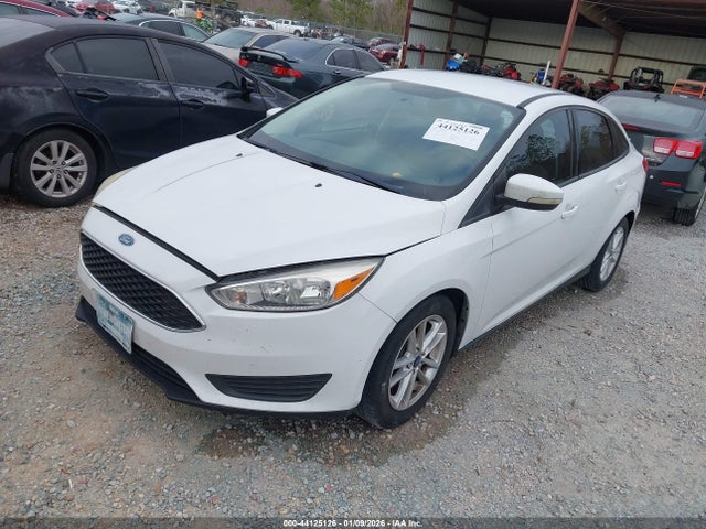 2015 FORD FOCUS 1FADP3F2XFL219567 Photo 1