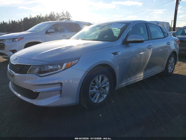 KNAGT4L38G5110873 KIA Optima Lx