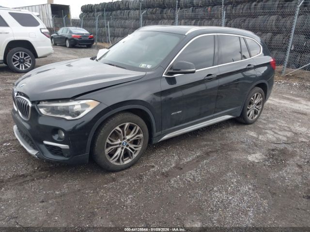 2016 BMW X1 WBXHT3C31GP880261 Photo 1