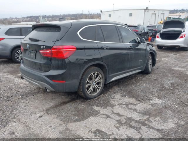 2016 BMW X1 WBXHT3C31GP880261 Photo 3