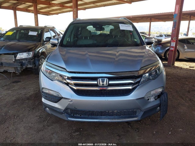 5FNYF6H94HB056656 Honda Pilot Touring