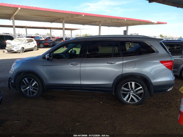 5FNYF6H94HB056656 Honda Pilot Touring