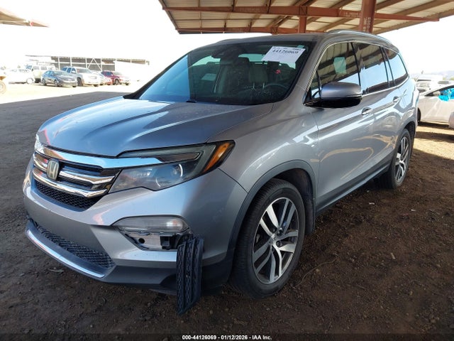 5FNYF6H94HB056656 Honda Pilot Touring