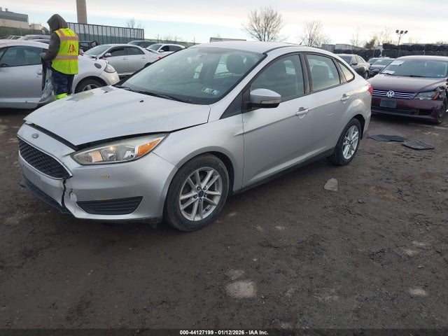 2015 FORD FOCUS 1FADP3F23FL372274 Photo 1