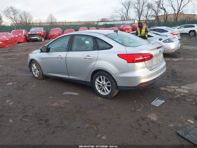 2015 FORD FOCUS 1FADP3F23FL372274 Photo 2