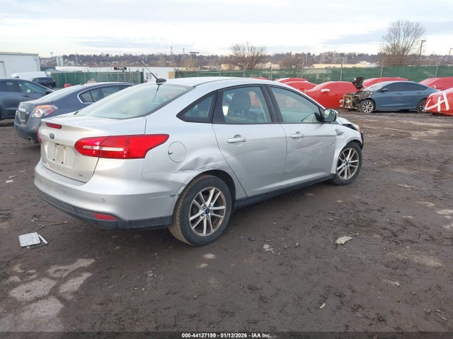 2015 FORD FOCUS 1FADP3F23FL372274 Photo 3