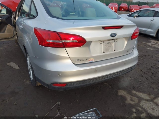 2015 FORD FOCUS 1FADP3F23FL372274 Photo 5