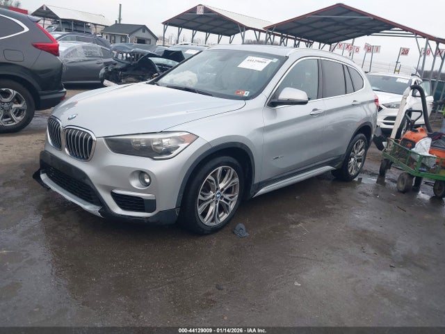 2016 BMW X1 WBXHT3C34GP883932 Photo 1