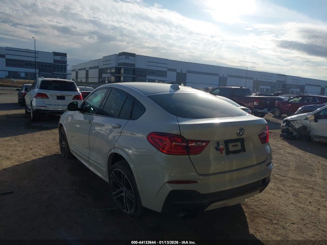 2015 BMW X4 5UXXW3C53F0M89233 Photo 2
