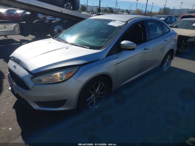 2016 FORD FOCUS 1FADP3F27GL205868 Photo 1