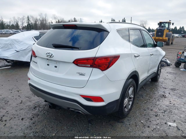 5NMZUDLB5HH034124 Hyundai Santa Fe Sport 2.4l