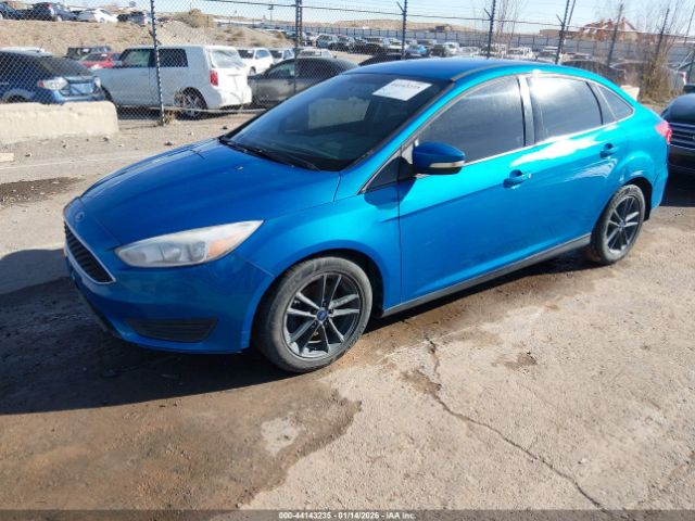 2015 FORD FOCUS 1FADP3F29FL374935 Photo 1