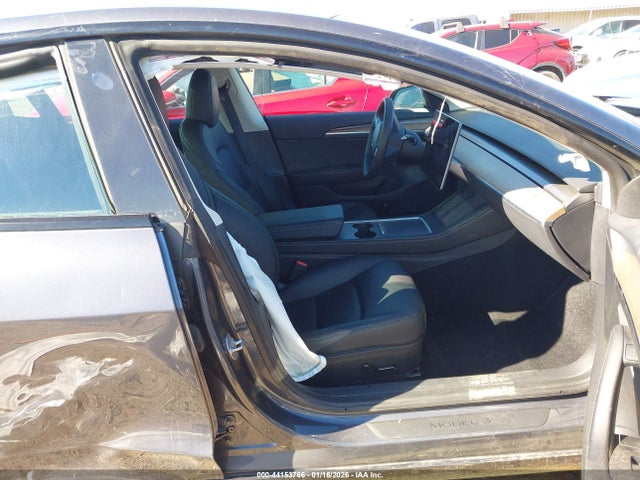 2023 TESLA MODEL 3 5YJ3E1EA1PF557257 Photo 4