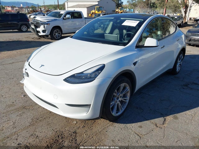 2023 TESLA MODEL Y 7SAYGDEE9PA080338 Photo 1