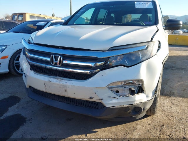 5FNYF5H16GB031017 Honda PILOT LX