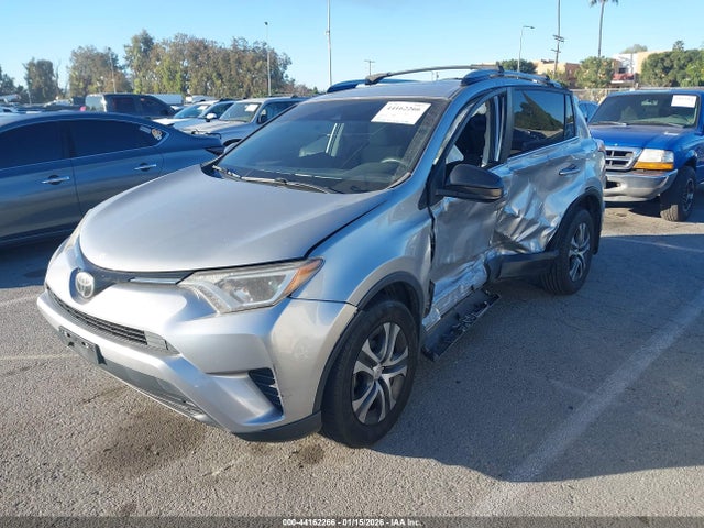 JTMZFREV8JJ183495 Toyota RAV4 LE