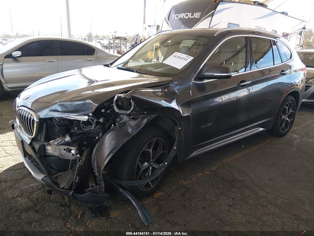 2017 BMW X1 WBXHT3C3XH5F85868 Photo 1