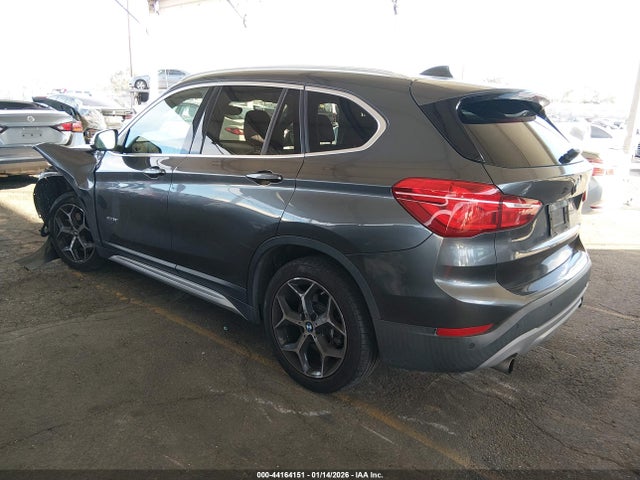2017 BMW X1 WBXHT3C3XH5F85868 Photo 2