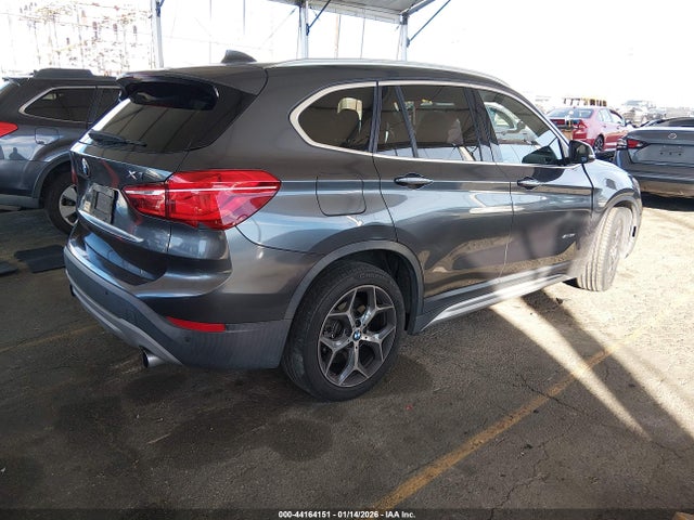 2017 BMW X1 WBXHT3C3XH5F85868 Photo 3